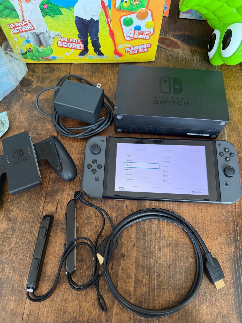 Nintendo Switch with Gray Joy‑Con Controllers and Dock